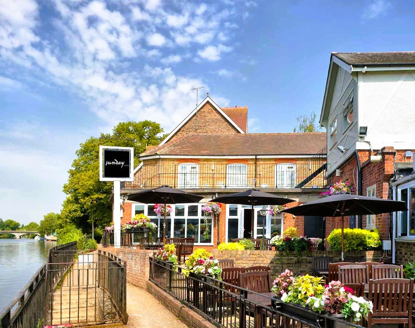 Staines Hotel by Sunday riverside view